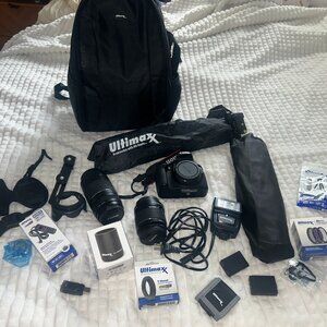 Full Canon EOS 2000D kit – 3 lenses, tripod, flash, SD cards, etc